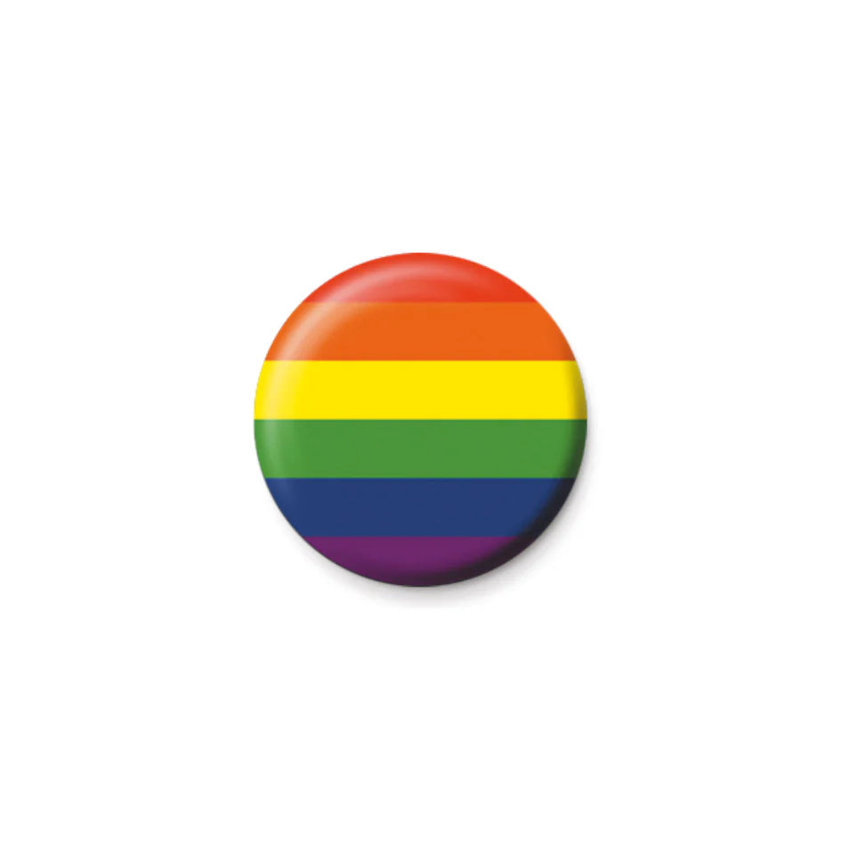 Close-up of the Rebel Romance Pride Flag Badge featuring the classic six-stripe rainbow design in red, orange, yellow, green, blue, and purple. A vibrant LGBTQ+ pin badge perfect for showing queer pride. From a UK small business celebrating inclusive, alternative fashion and expressive style for millennials.