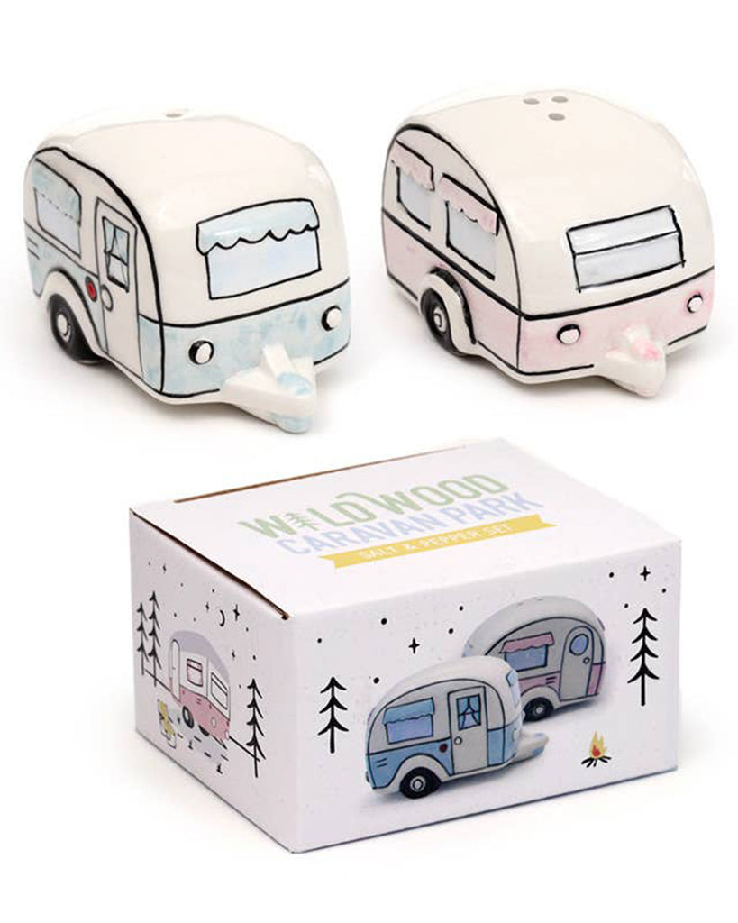 Complete set of ceramic caravan salt and pepper shakers shown with their illustrated gift box. Designed by Rebel Romance, these pastel pink and blue caravans add nostalgic charm to any home or camper kitchen.