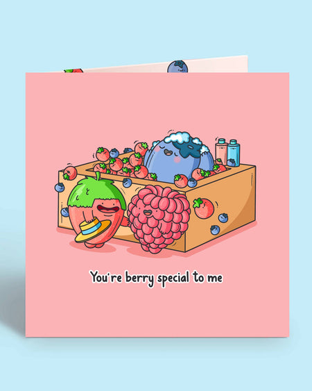 Front of the "You're berry special to me" greeting card by Toastedink, stocked at Rebel Romance. Shows cute cartoon strawberry, raspberry and blueberry in a fruit pun design perfect for alternative gift-givers.