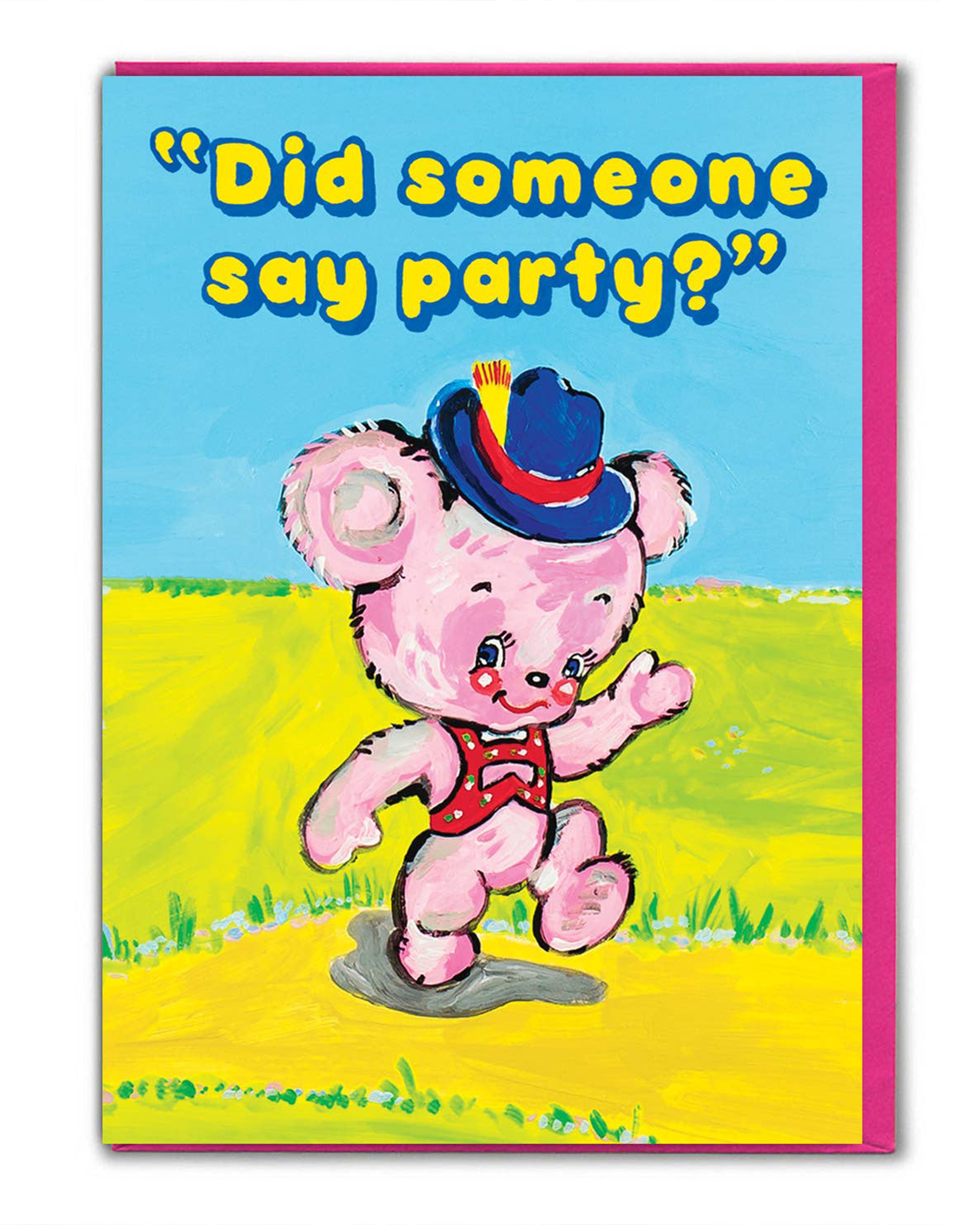 Rebel Romance Did Someone Say Party birthday card by Magda Archer. A kitschy pink bear illustration wearing a red waistcoat and blue hat with a feather, set against a bright yellow and blue background. Features bold retro text reading “Did someone say party?” in yellow with blue outline. A fun, quirky greeting card printed in the UK on FSC accredited card, blank inside, with a colourful envelope.