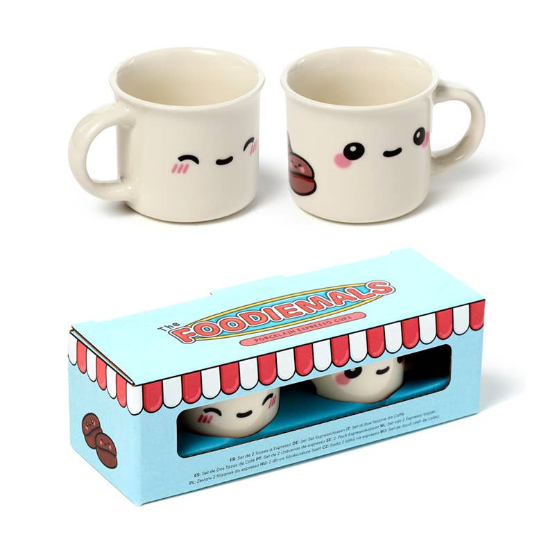 Porcelain espresso cup with an adorable Foodiemals face featuring round black eyes, pink cheeks, and a tiny smile. Designed by Rebel Romance, a UK indie brand known for its quirky, retro-inspired gifts and homeware.