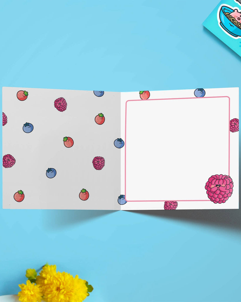 Open view of Rebel Romance’s Toastedink greeting card showing vibrant berry pattern inside with room to write. A fun fruity way to let someone know they’re special.