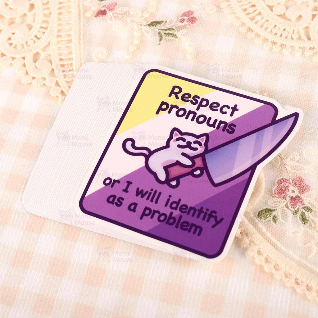 Sticker with a cat illustration and text about respecting pronouns on a textured background