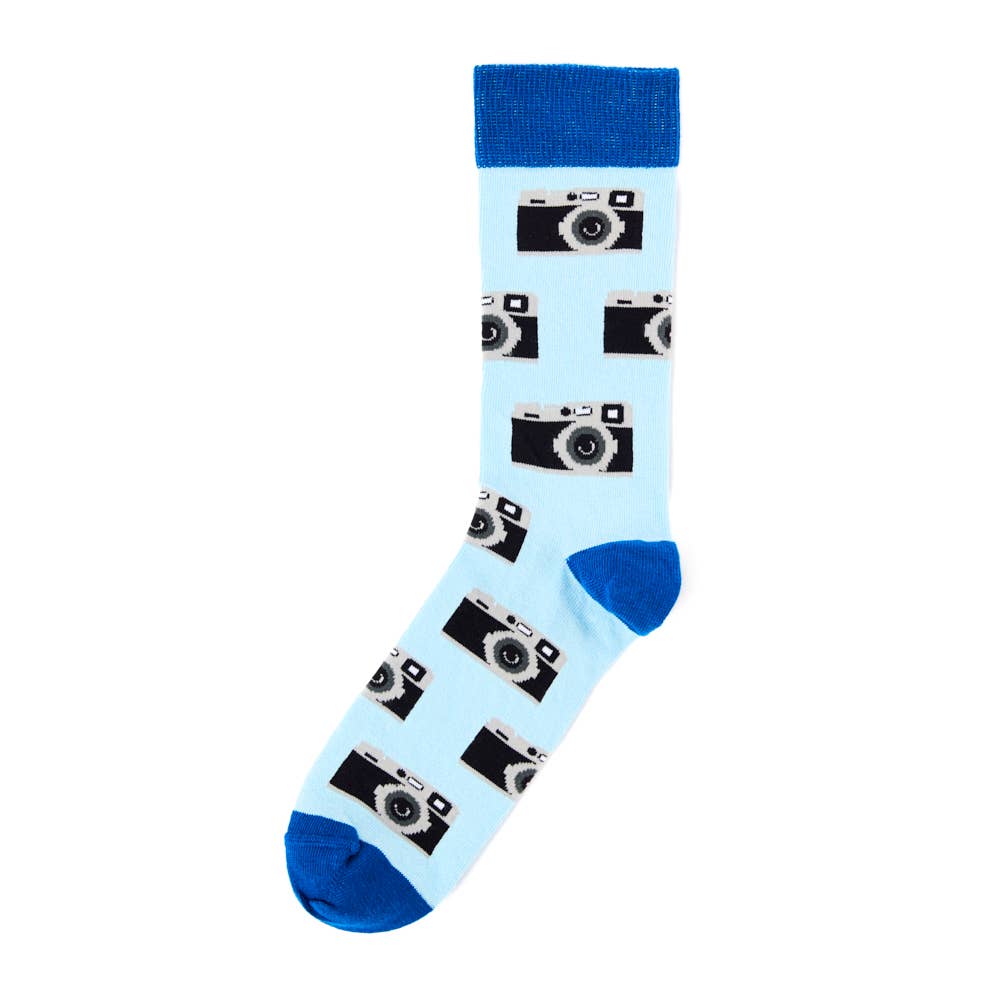 Light blue Urban Eccentric novelty socks featuring repeated black and grey camera illustrations with royal blue cuff, heel, and toe. Stocked by Rebel Romance.