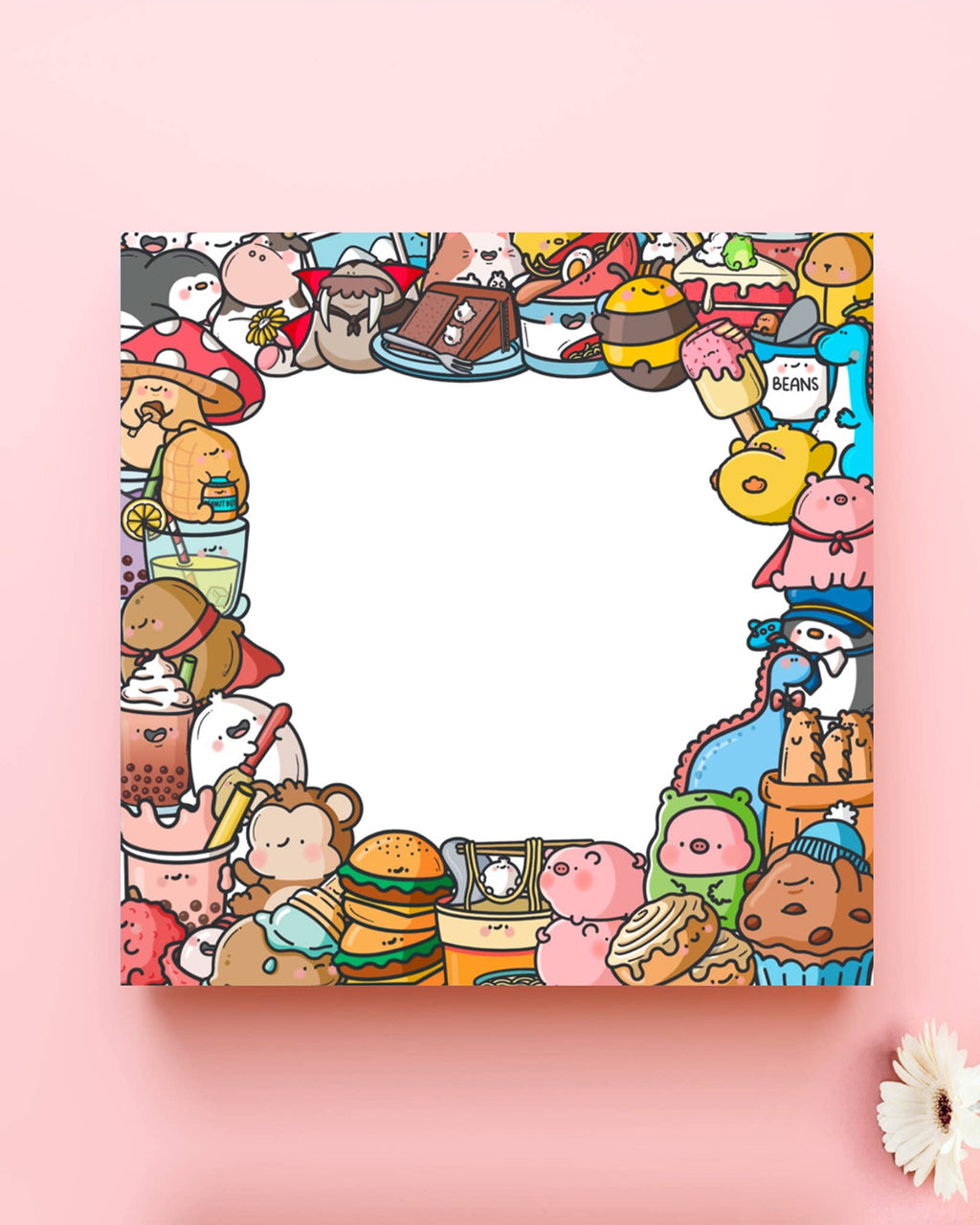 Envelope view of a quirky birthday card by Toastedink featuring a fun food-themed border with desserts, sushi, burgers, and cute characters. The centre is blank for your own message. Sold by Rebel Romance, a UK indie brand for bold and playful stationery.