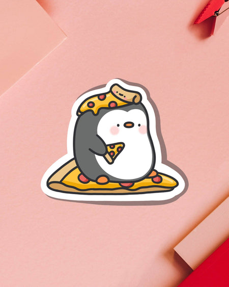 Rebel Romance product photo featuring the Cute Pizza Penguin Vinyl Sticker by Toastedink. Penguin is holding, sitting on, and wearing pepperoni pizza. A glossy, high-quality vinyl sticker perfect for kawaii lovers and foodie vibes.