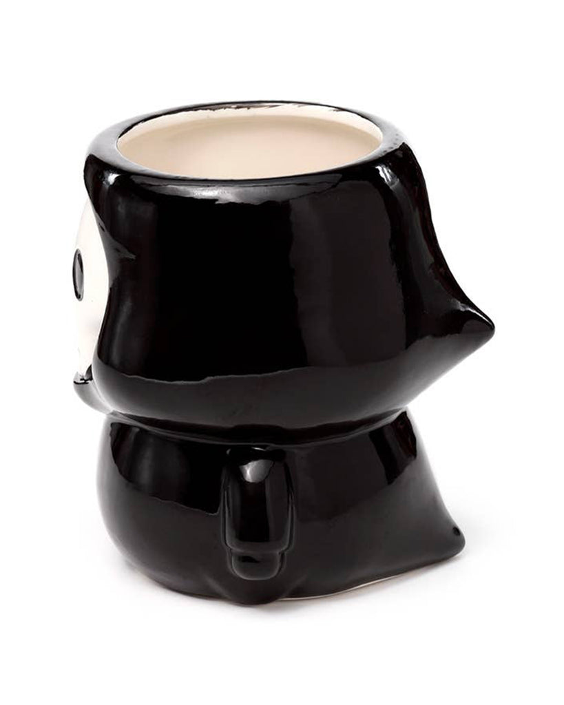 Side view of the Skull Boy Ceramic Shaped Mug by Rebel Romance, showing the figure’s black hood and robed form. A fun gothic twist for your morning brew.
