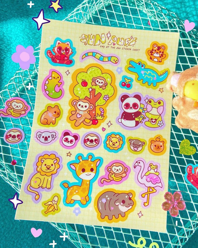 Cute A6 vinyl sticker sheet featuring zoo animal designs including monkeys, giraffe, red panda, lion, flamingo, crocodile, panda, and more. Perfect for planners, scrapbooks, crafts and decorating. Gloss vinyl finish keeps colours vibrant and weatherproof.