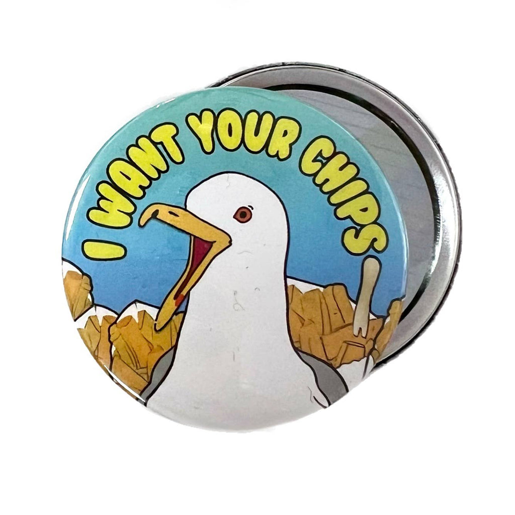 Funny seagull pocket mirror from Rebel Romance, a small UK brand celebrating alternative style. Features a bold cartoon seagull yelling "I Want Your Chips" in bright yellow text, surrounded by chips and a seaside sky. Designed by Bite Your Granny. Perfect quirky gift for millennials who love seaside humour, retro aesthetics, and rebellious accessories. A unique compact mirror for bags or travel.