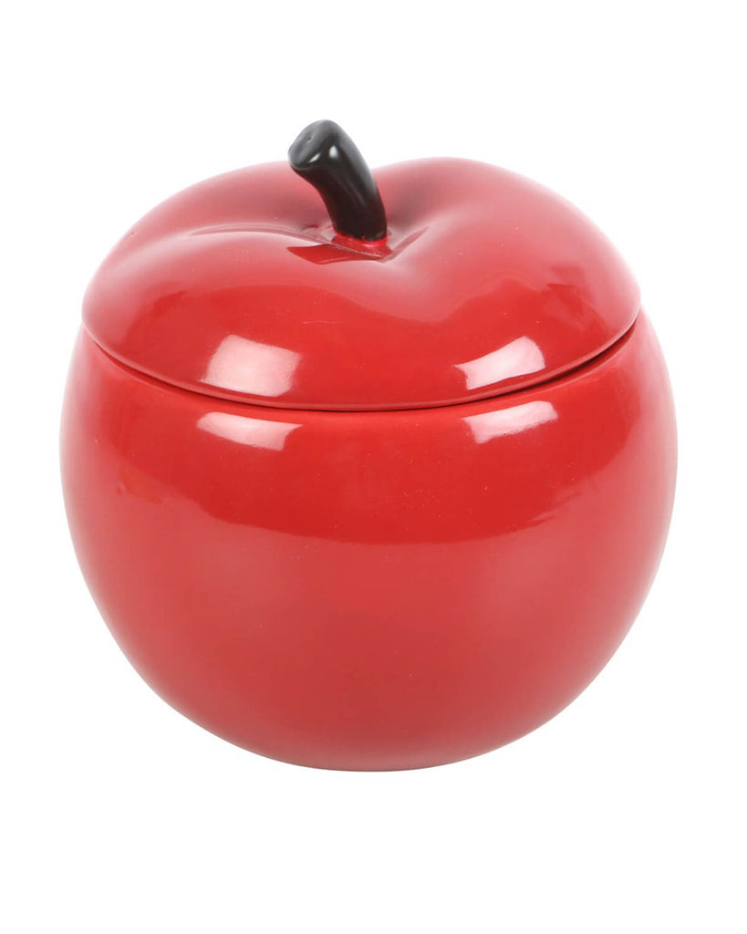 Glossy red apple-shaped oil burner with a black ceramic stem on top.