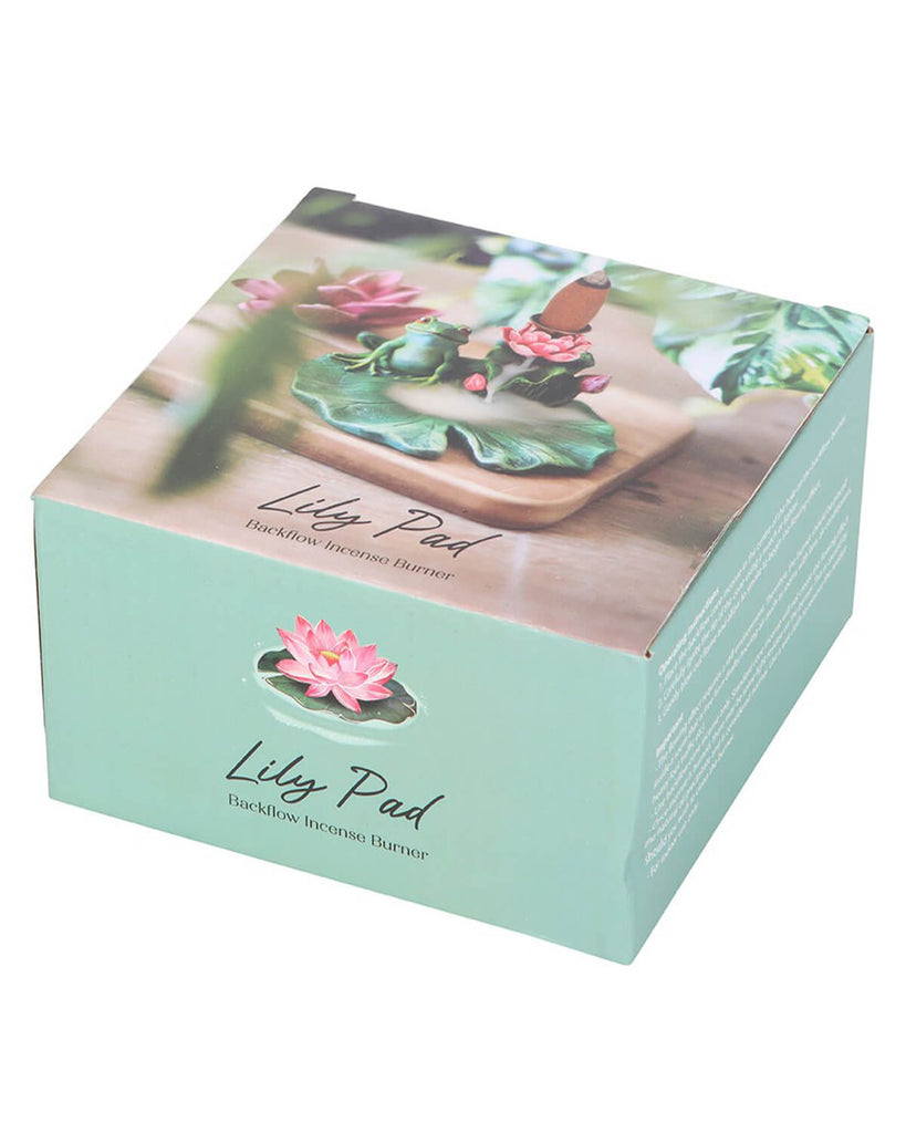 Product packaging featuring a photo of the lily pad incense burner with soft pastel green design and ‘Lily Pad Backflow Incense Burner’ text.