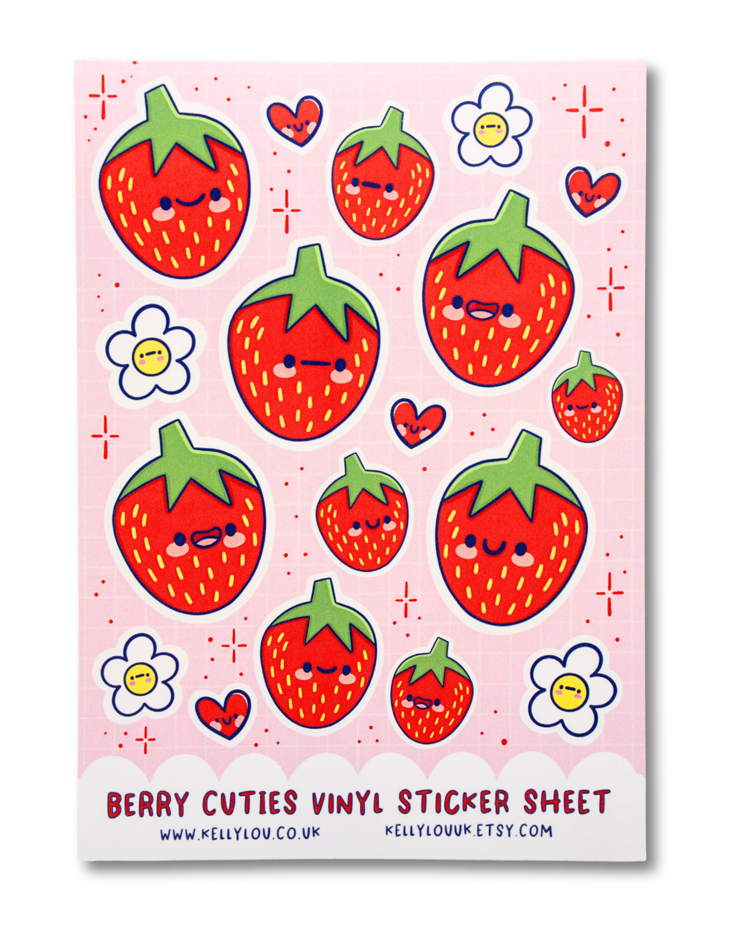 Vinyl sticker sheet with cute strawberry designs on a pink background