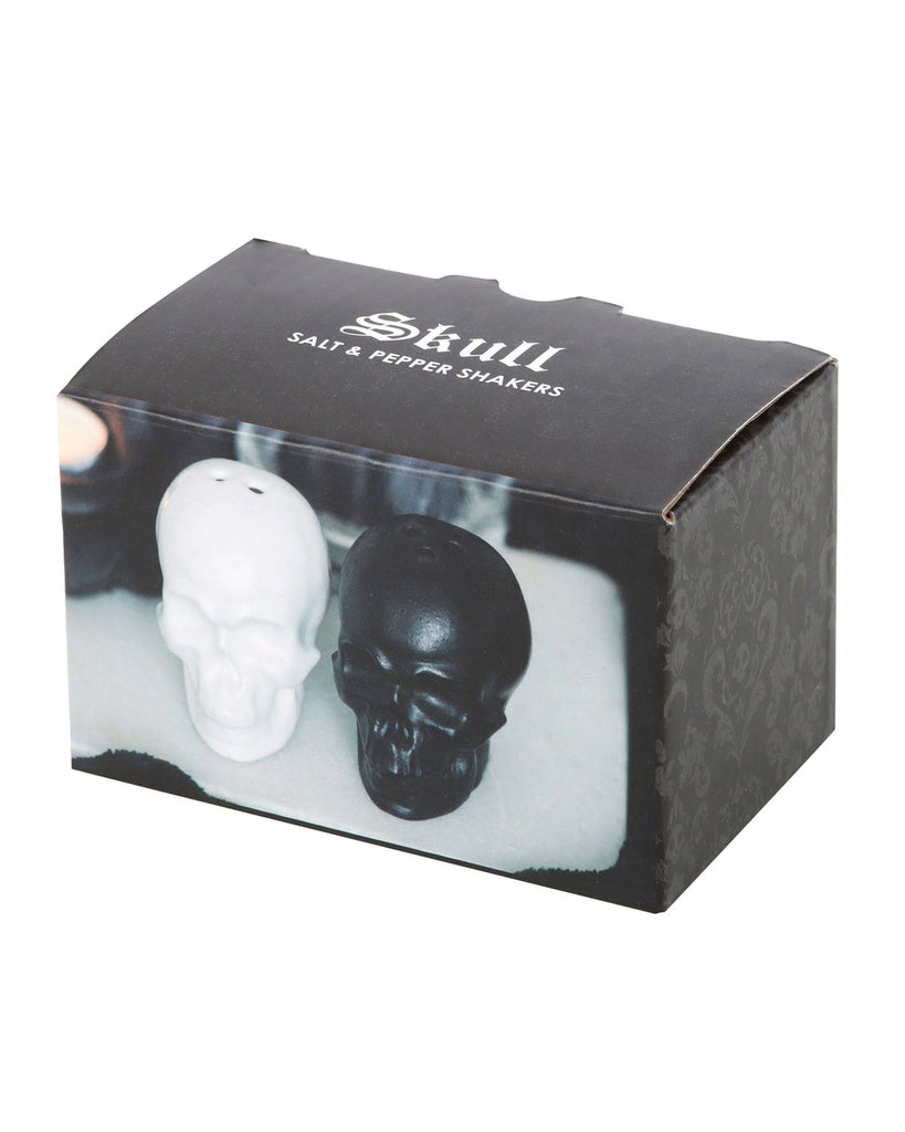 Box packaging for the skull salt and pepper shakers, showing product image and gothic-themed design.
