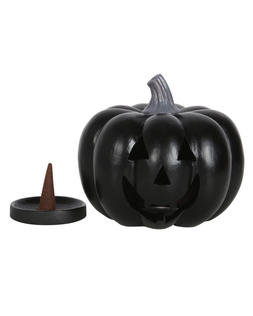 Black pumpkin incense cone holder with a removable lid, showing the interior and a separate black tray with an incense cone ready for use.