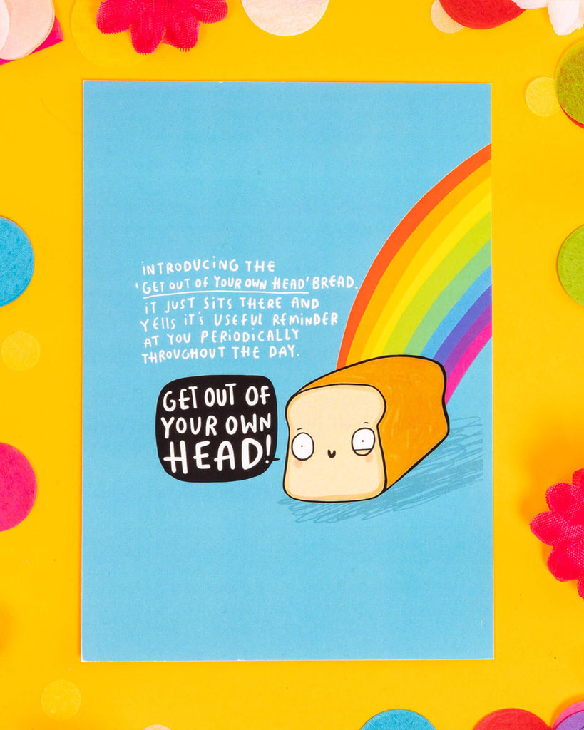 A colourful A6 postcard featuring a cute cartoon loaf of bread shouting “Get out of your own head!” on a blue background with a rainbow. Designed by Katie Abey, this motivational postcard is perfect for millennials who love quirky mental health reminders, dopamine décor, and alternative humour with a positive twist.