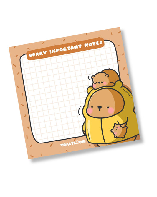 Notepad with cartoon bear design and grid area, featuring the brand 'Toast & Jam'.