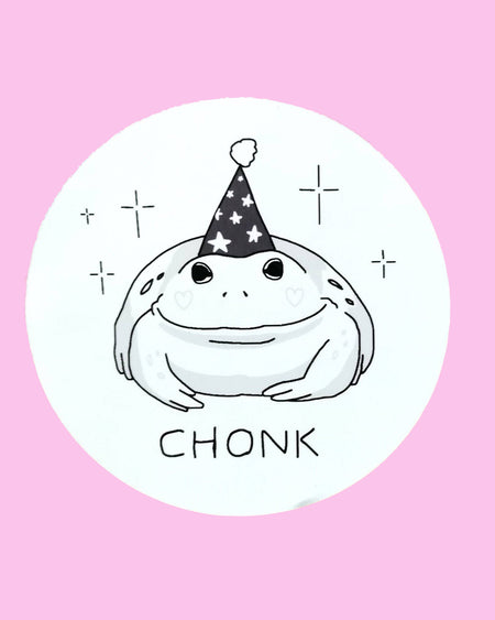 A round glossy sticker featuring a black and white hand-drawn illustration by Nimbob of a chubby, wide-eyed frog wearing a starry party hat. The frog has tiny heart-shaped blush marks on its cheeks and is surrounded by sparkles. Below, the word ‘CHONK’ is written in a playful, handwritten font. A cute and whimsical sticker, perfect for frog lovers and fans of chonky creatures!