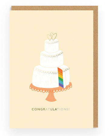 Minimalist LGBTQ+ wedding or celebration card from Rebel Romance featuring a white tiered cake with two hearts on top and a rainbow layer slice revealed. The text “Congratulations!” is printed below in a clean, elegant font. A perfect card for queer weddings, civil partnerships, engagements, or proud moments of love and joy. Ideal for alternative stationery lovers and inclusive gifting.