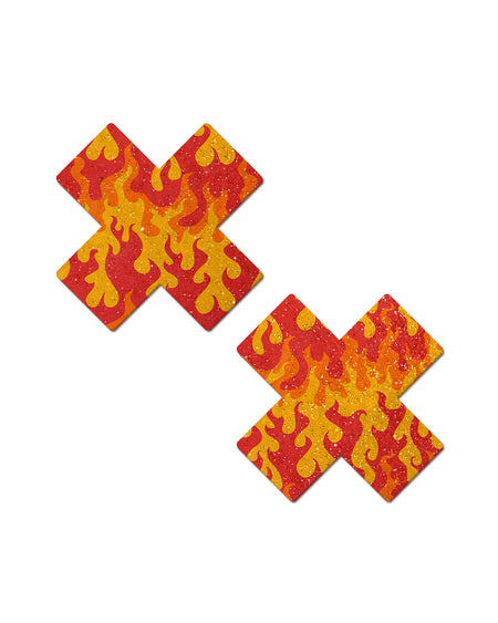 Plus X: Flaming Sparkle Cross Nipple Pasties by Pastease® o/s. Two glittery flame cross nipple covers on a white background. Perfect for a festival, pride, burlesque performance, only fans content or a party.
