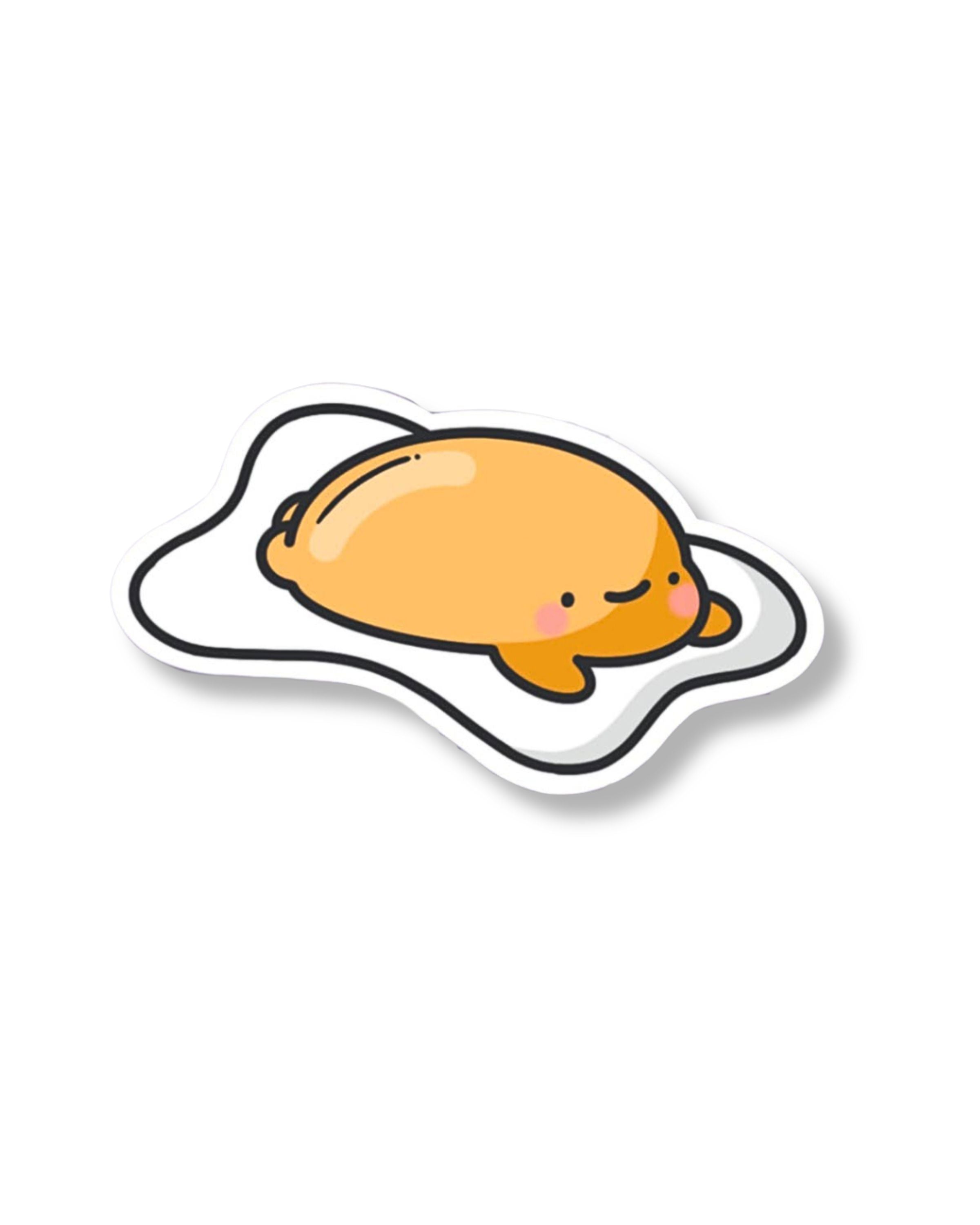 Happy fried egg sticker lounging on a glossy white base, designed by Toastedink. Set on a baby blue backdrop, this sticker is a playful addition to the Rebel Romance collection of cute, foodie-inspired accessories.