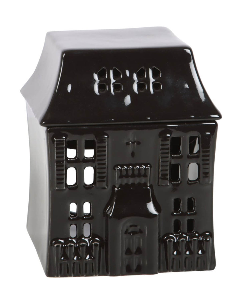 The full view of the haunted house oil burner with gothic detailing, tiny window cutouts, and a pointed roof, against a neutral background.