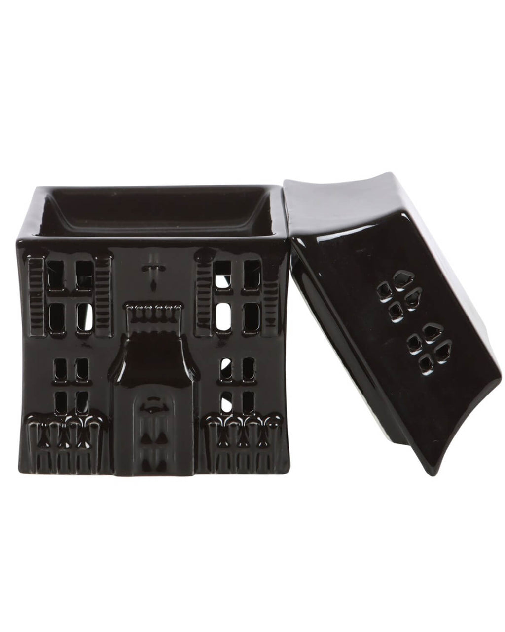 The haunted house oil burner with its removable roof lifted off, revealing the bowl for wax melts or oil.