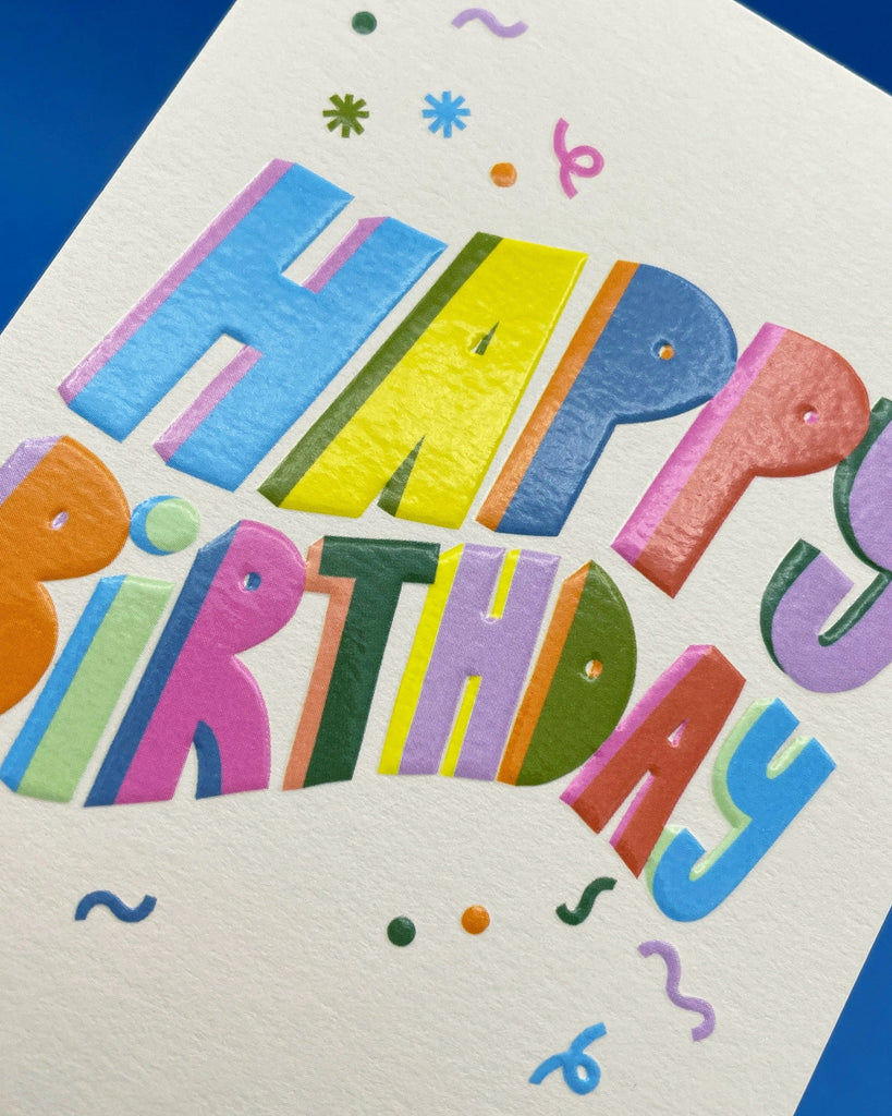 Happy Birthday mini card by Raspberry Blossom featuring bold colourful lettering and confetti design, made in the UK