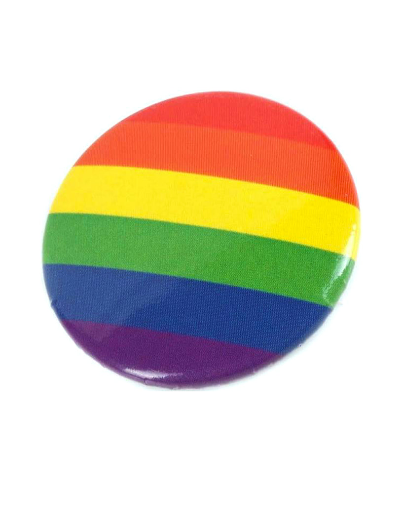 Angled view of the Rebel Romance Pride Flag Badge with bold rainbow stripes representing the LGBTQ+ flag. A colourful pin for expressing identity and solidarity. Designed by a UK indie brand that celebrates queer pride, alternative style, and millennial creativity.