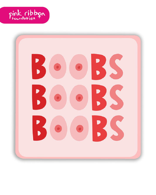 Square pink coaster with the word “BOOBS” repeated three times in bold red letters, with the “O’s” replaced by pink breast illustrations. Pink Ribbon Foundation logo in the top left corner.
