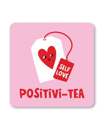 A square pink coaster featuring a smiling tea bag with a red heart and a tag that says Self Love. Below, the words Positivi-Tea are written in bold red letters.