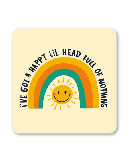 Square cream coaster with a retro rainbow arch and a yellow smiley sun in the middle. Black text reads “I’ve got a happy lil head full of nothing” around the design.