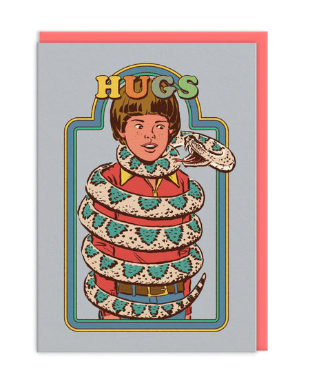The “Hugs” card paired with its bright orange envelope, styled against a black background. The playful retro illustration and vibrant colours make it a standout choice for sending warm wishes with a quirky twist.