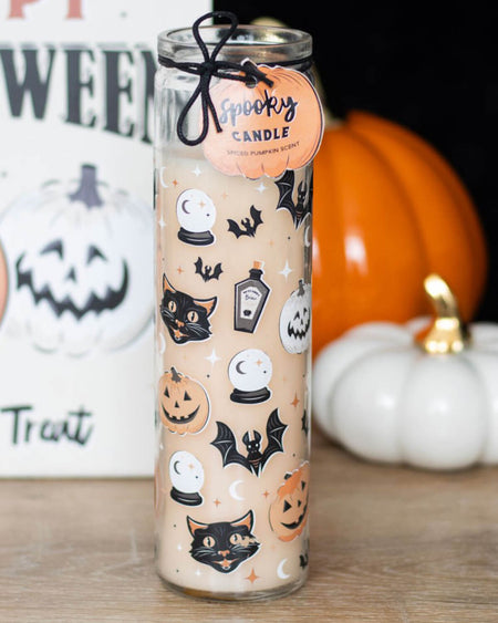 Close-up of the Spooky Spiced Pumpkin Tube Candle with retro black cat and pumpkin design.