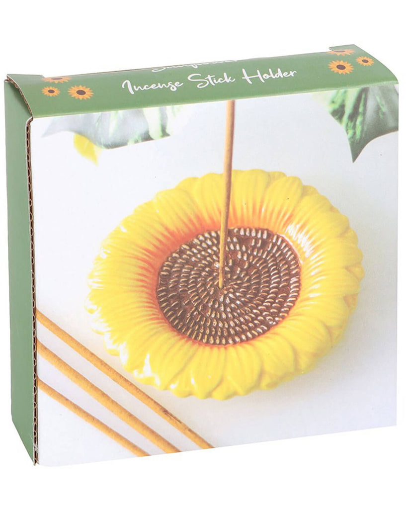 Product packaging displaying the sunflower incense holder and incense sticks on a soft green box design with a nature-inspired theme.
