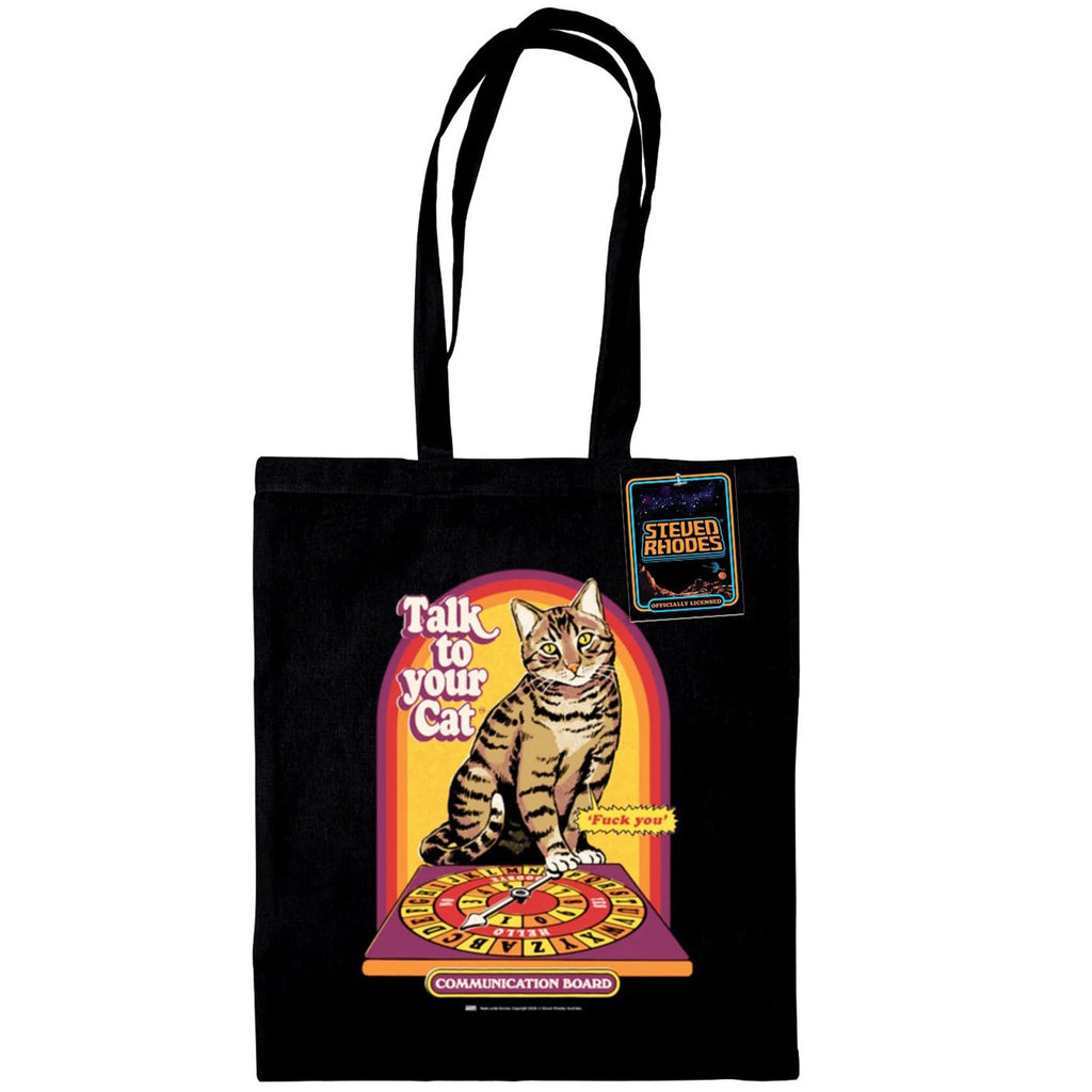 A black tote bag featuring a retro-inspired Steven Rhodes design titled “Talk to Your Cat.” The graphic shows a tabby cat sitting on a colourful communication board, with humorous text and a vintage aesthetic.