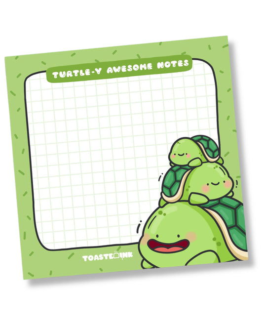 Notepad with cartoon turtles and 'Turtle-y Awesome Notes' text on a green background