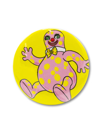 Yellow button badge with an 80s icon, mr blobby, a pink and yellow polka dot character smiling wearing a bow tie. Retro inspired design from Bite Your Granny.