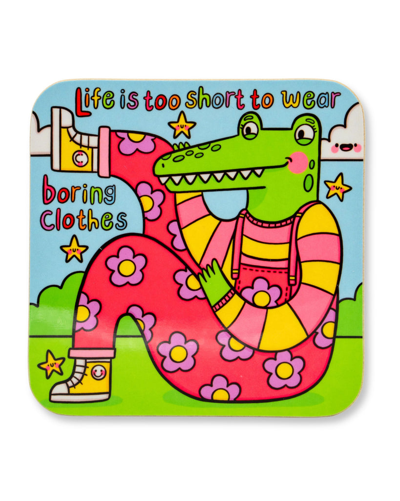 Glossy square coaster by Rebel Romance featuring a vibrant illustration by Kellylou of a green crocodile wearing colourful striped and floral clothing with the slogan "Life is too short to wear boring clothes". A fun and bold homeware gift for fans of quirky and alternative style. Made from durable hardboard MDF with a shiny finish. Perfect for desks and coffee tables.