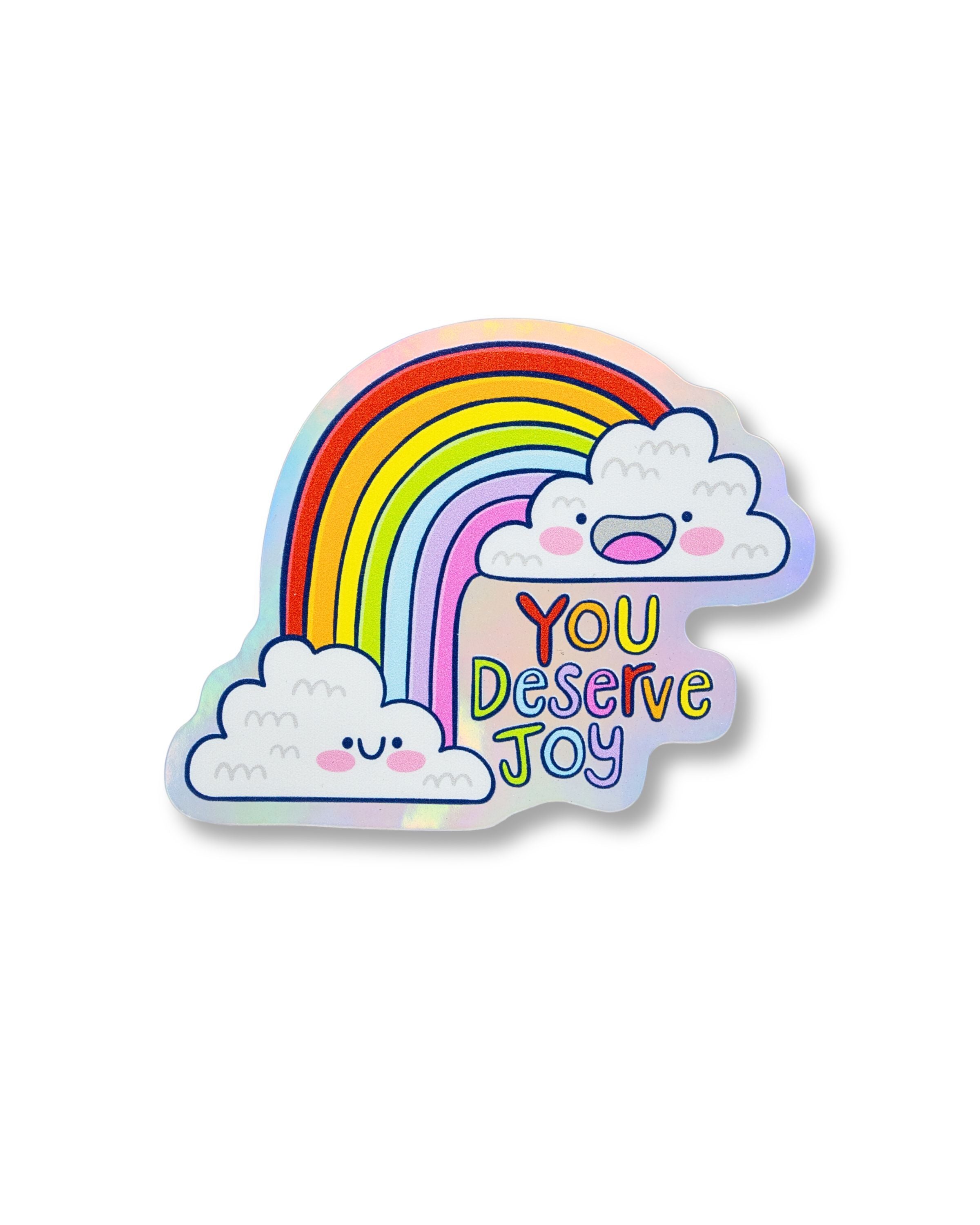 Holographic vinyl sticker from Rebel Romance featuring a cheerful rainbow between two smiling clouds with the words 