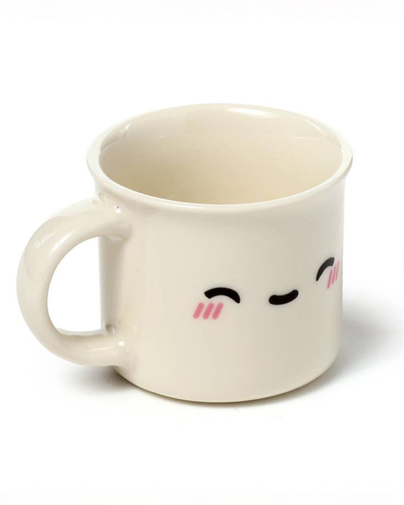 Foodiemals espresso cup set by Rebel Romance shown, 1 cup shown outside of the box. Features a kawaii-style porcelain cups with smiling blushed cheek expression, perfect for gifting to a coffee-obsessed friend or treating yourself.