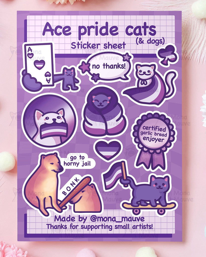Asexual Pride Cats and Dogs sticker sheet by Mona Mauve featuring 10 waterproof vinyl stickers with ace pride colours, cute cats and dogs, garlic bread, flags, and slogans like “no thanks” and “go to horny jail.” A funny and inclusive sticker set perfect for celebrating asexuality, sold by Rebel Romance, a UK small business supporting LGBTQ+ pride.