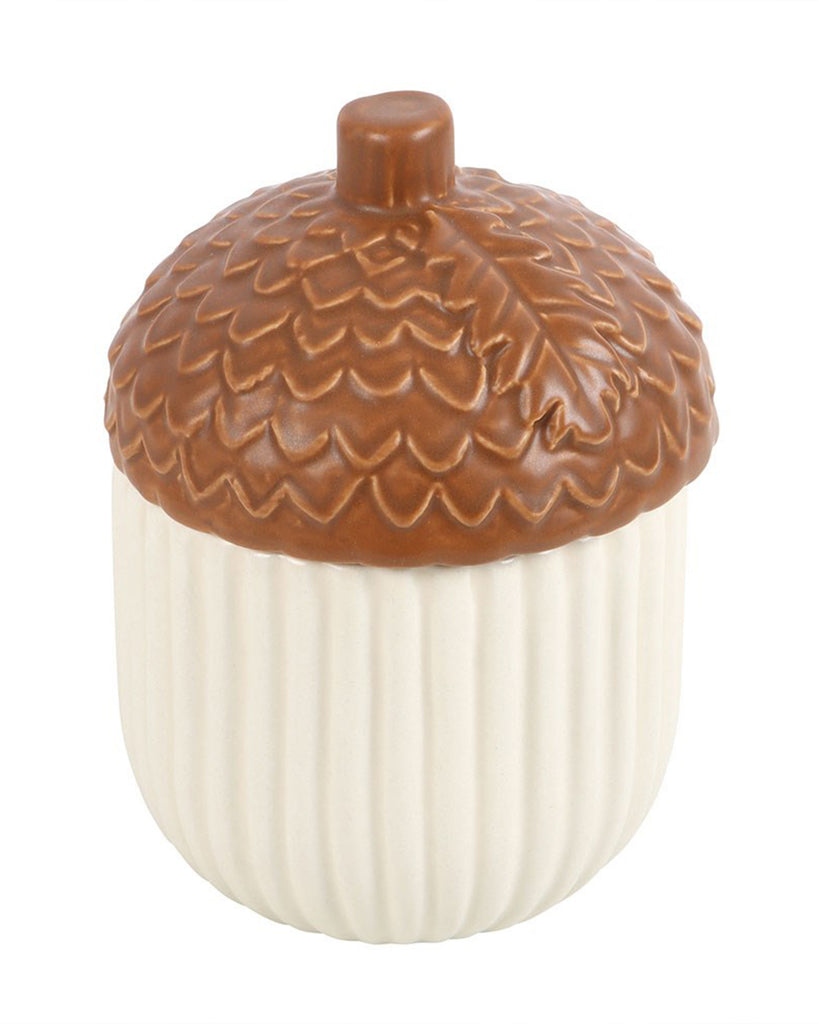 Side view of the Autumn Acorn Ceramic Storage Jar with a ribbed cream base and sculpted acorn lid. A charming, practical piece from Rebel Romance, blending seasonal warmth with stylish design.