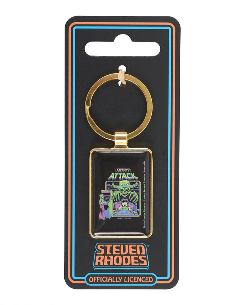 Anxiety Attack keyring by Steven Rhodes displayed on official branded backing card. The keyring features a neon retro arcade monster design. Sold by Rebel Romance, a UK alternative shop specialising in unique gifts, gothic fashion and quirky homeware.