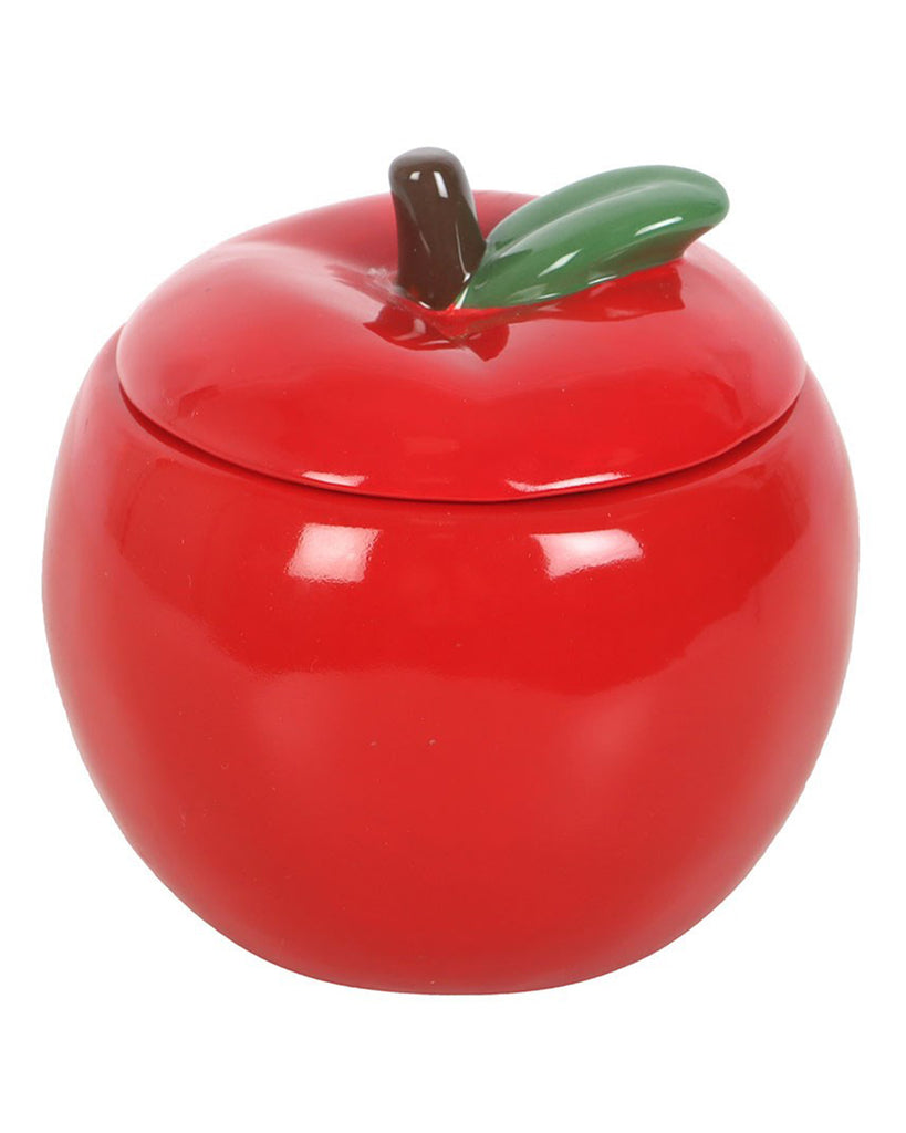 Front-facing image of the apple-shaped candle jar with the lid closed. The jar is smooth and glossy, styled to resemble a red apple with a realistic stem and leaf on top.