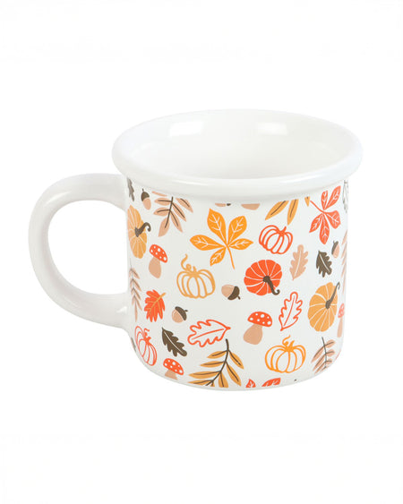 A front-facing view of the mug, highlighting the vibrant pumpkin and leaf design that covers the entire mug.