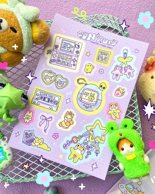 Pastel purple A6 sticker sheet from Rebel Romance featuring nostalgic 90s-style trinkets designed by Sun Puff Studios. Includes cute Tamagotchi, heart cassette tape, game console, duck plushie, laptop, stars, and whimsical accessories. Printed on glossy vinyl for weatherproof durability. A dreamy sticker set for journalling, scrapbooking, and decorating with Y2K vibes. Ideal for fans of kawaii, retro, and indie stationery aesthetics.