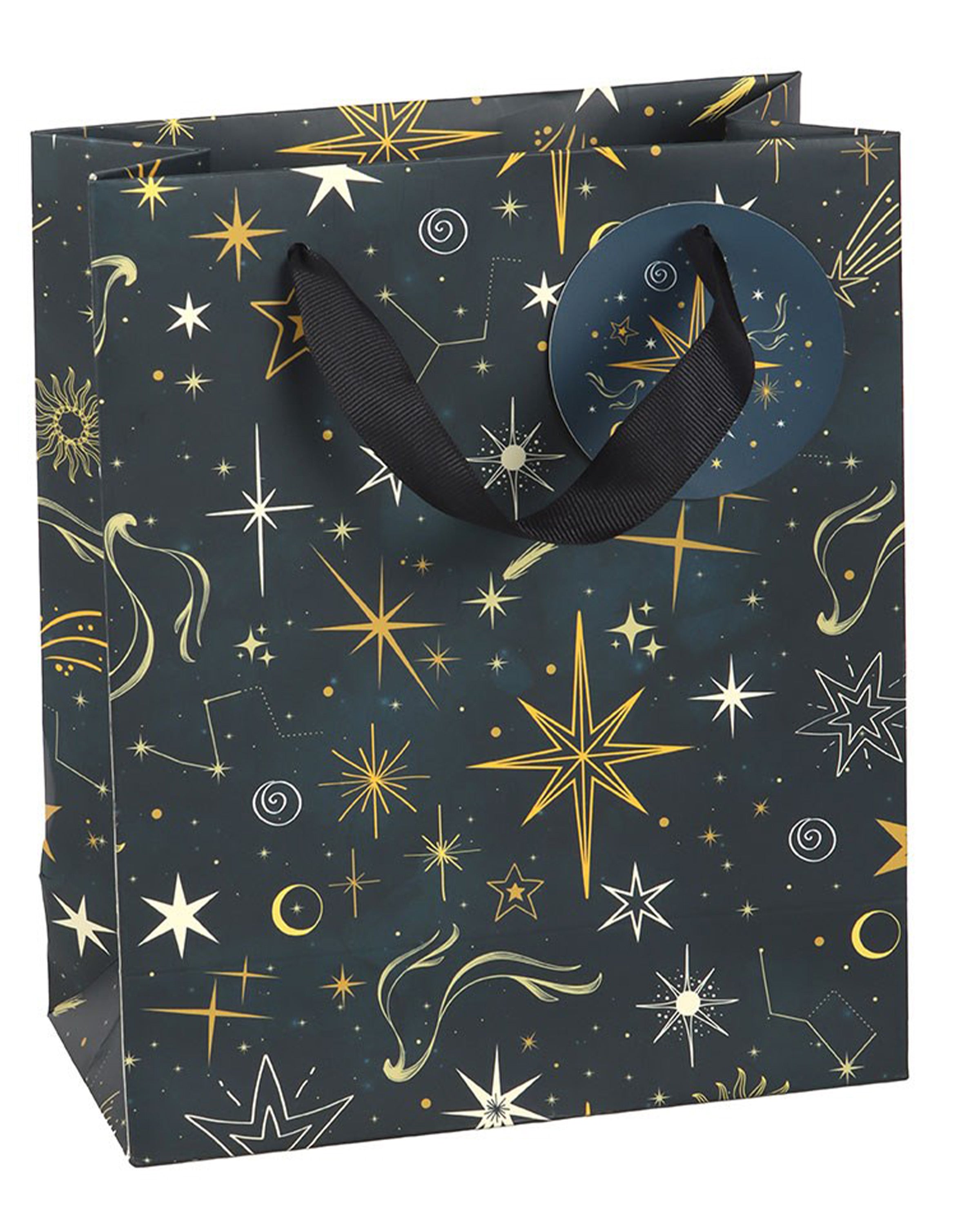 Medium Starry Night gift bag with black ribbon handles, decorated with gold stars and constellations on a navy background, photographed upright on a white surface.