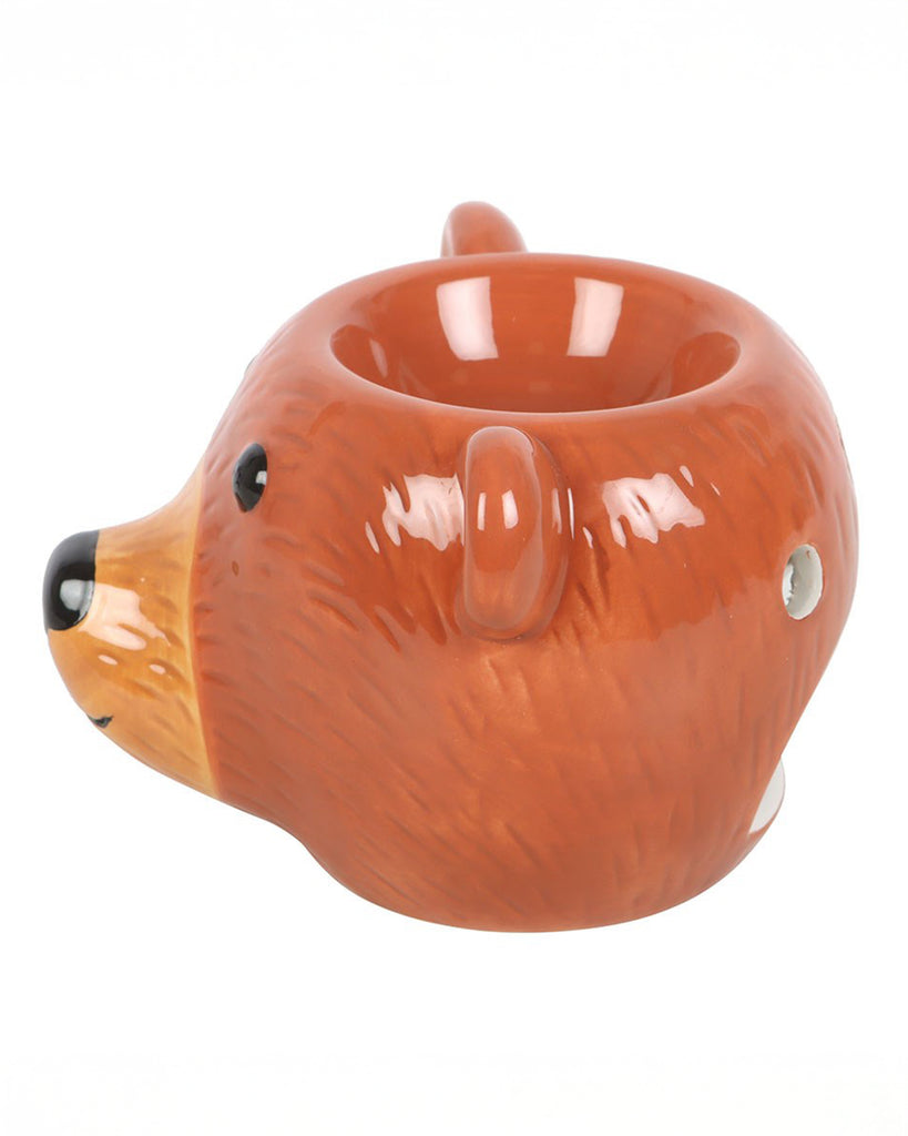 Side profile of the Rebel Romance ceramic Bear Shaped Oil Burner, showing its cute 3D bear nose, ears and side holes for light. A playful, retro-inspired design that adds charm to your aromatherapy setup or cosy corner.