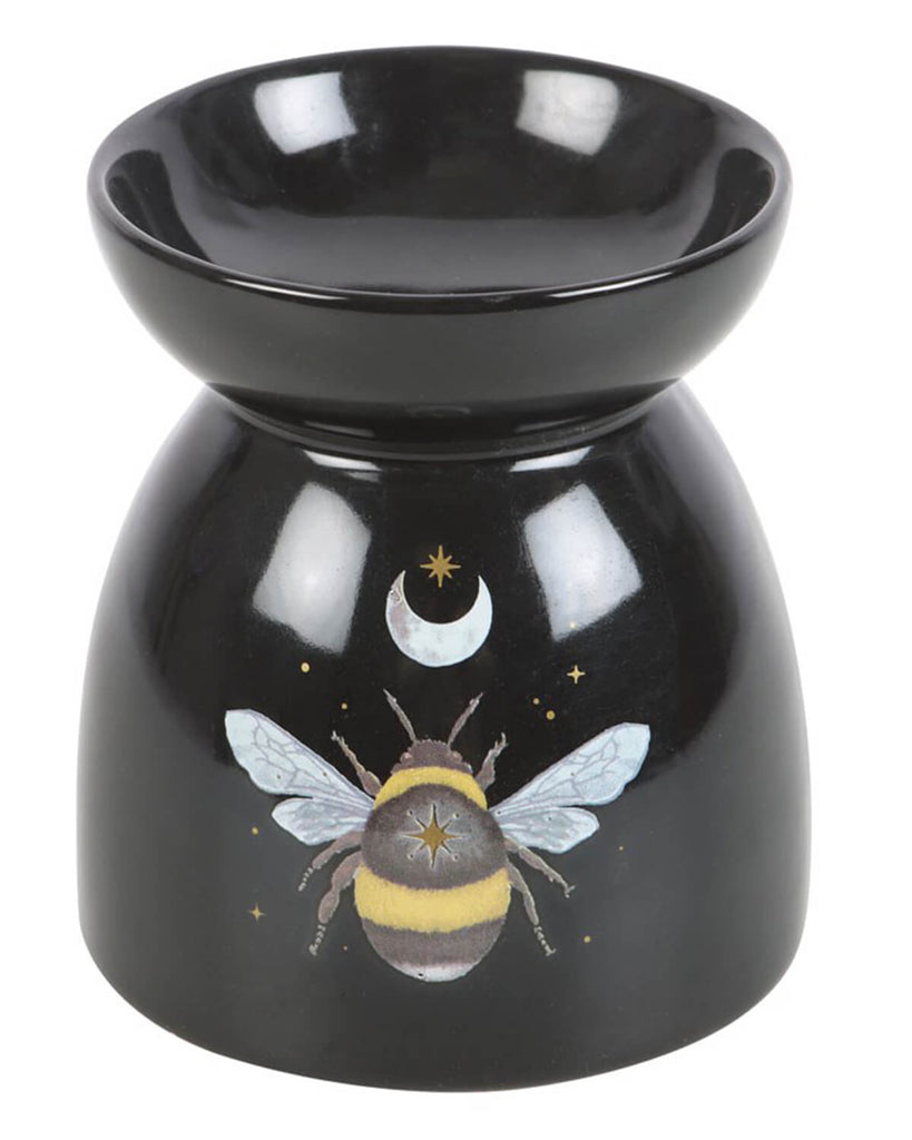 	A glossy black ceramic oil burner with a mystical forest bee design, featuring a yellow and black bee, a crescent moon, and gold stars.