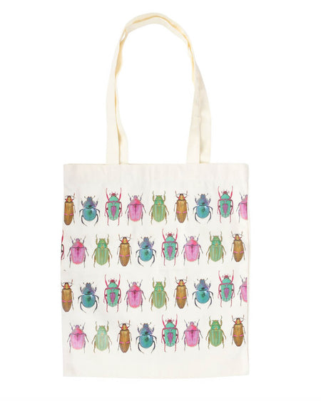 Close-up of the tote bag featuring a colourful beetle print pattern with pink, green, and gold beetles lined up in rows.